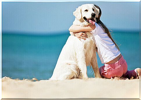 girl-hugging-dog